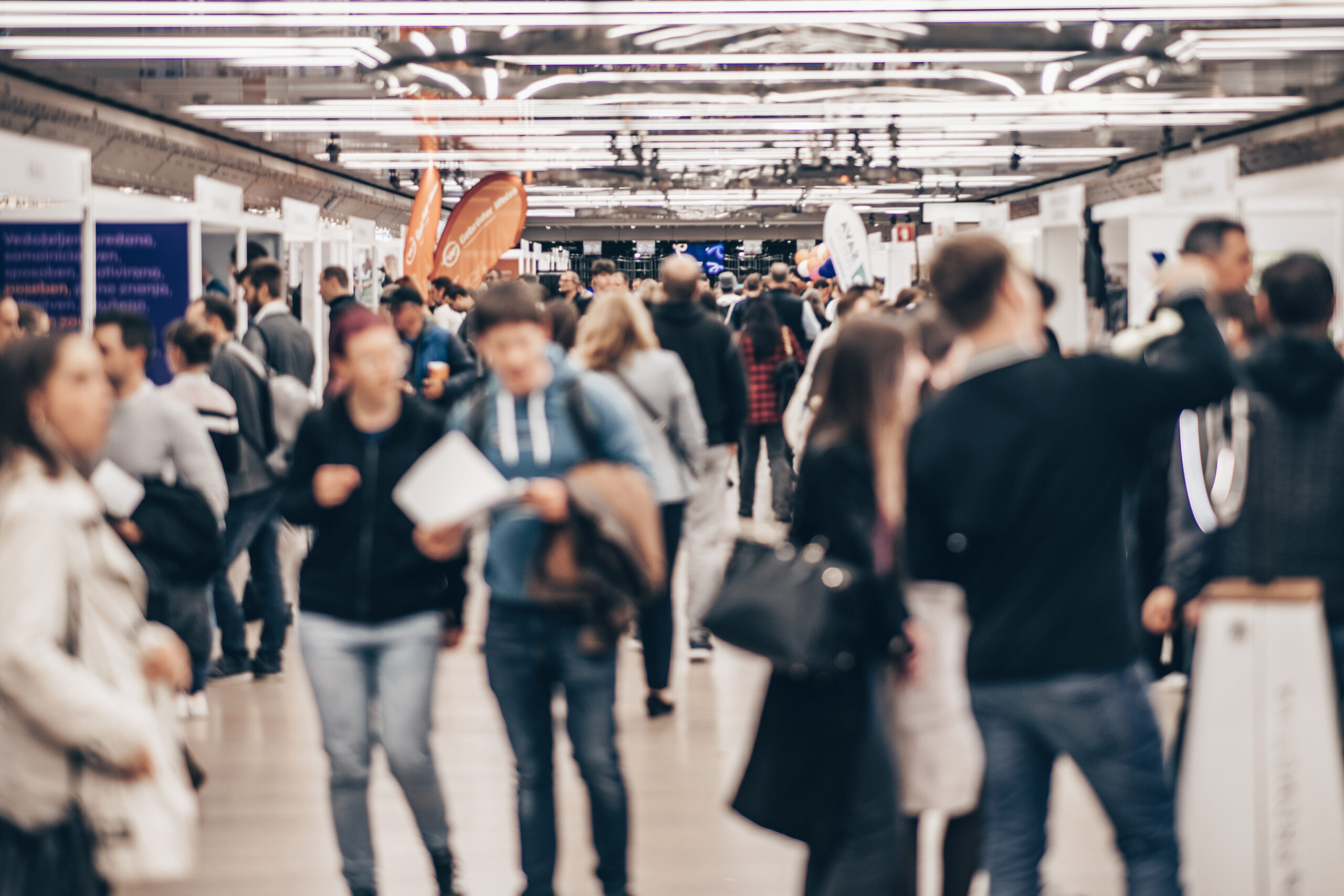 Abstract blurred people at exhibition hall of expo event trade show. Business convention show or job fair. Business concept background